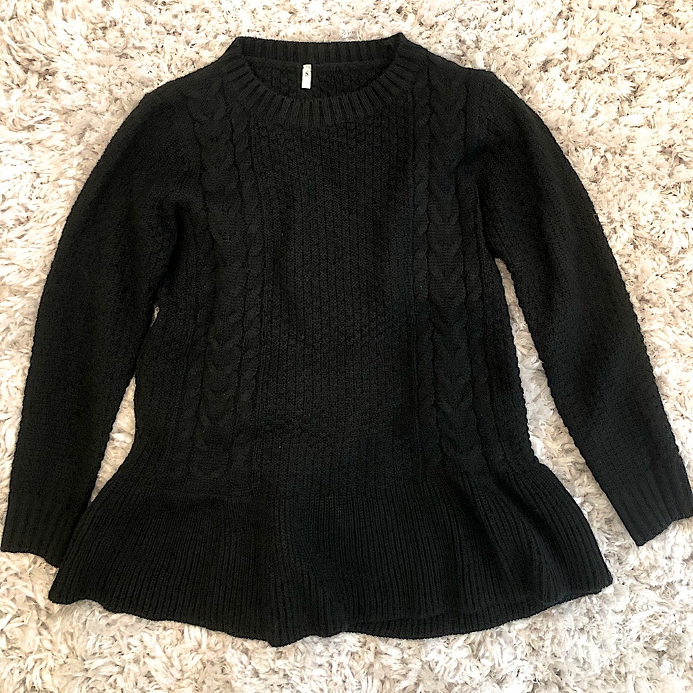 Unique black bell shaped sweater. Very chic!